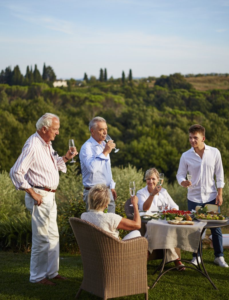 enjoying a glass of wine
